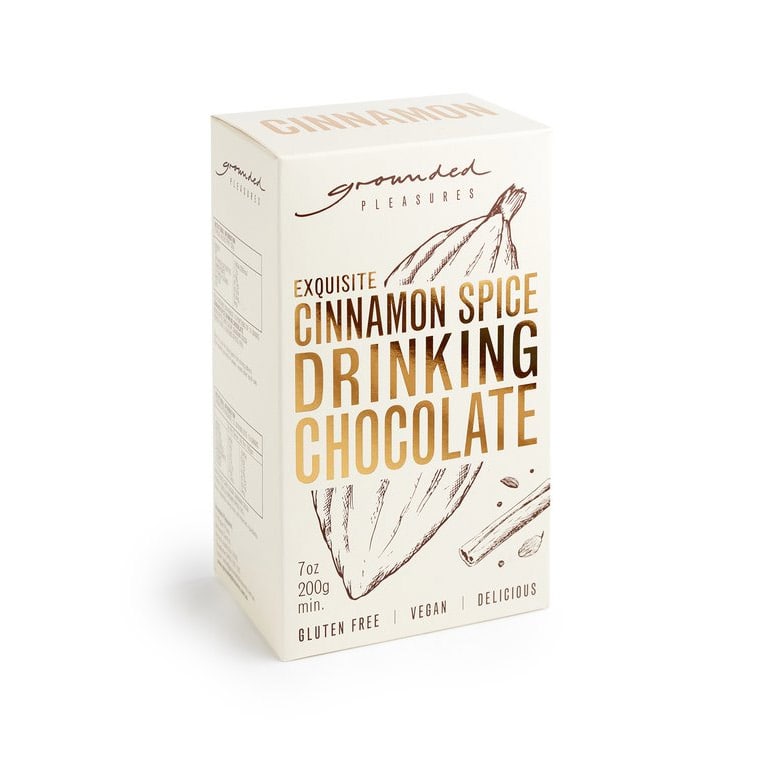 Box of cinnamon spice drinking chocolate on a white background